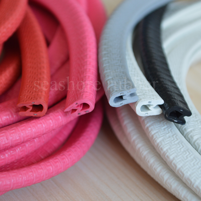 8 plastic pvc trim seal with sheet metal edge protector.jpg 8 plastic pvc trim seal with sheet metal edge protector.jpg